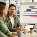 Project manager discussing an automation rollout plan with a UK manufacturing client